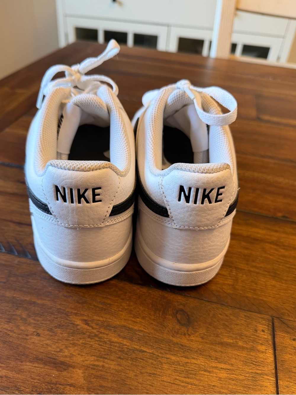 Nike White Low-Top Sneakers with Black Swoosh Accent Size 8 - Picture 2 of 4